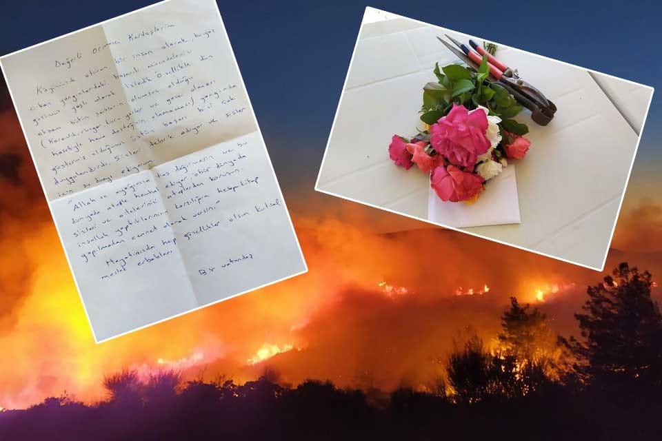 İzmir'in Urla il&ccedil;esinde &ccedil;ıkan yangında g&ouml;revliler i&ccedil;in, g&uuml;l demetiyle birlikte