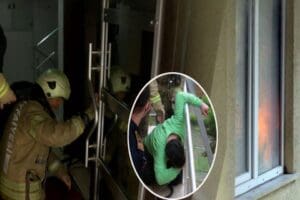 İstanbul Maltepe'de yangın &ccedil;ıkan evde mahsur kalan kişi, itfaiyenin kapıyı