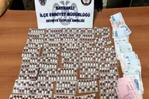 İzmir'in Bayraklı il&ccedil;esinde, polisi g&ouml;r&uuml;nce elindeki poşeti atıp ka&ccedil;an ş&uuml;pheli,