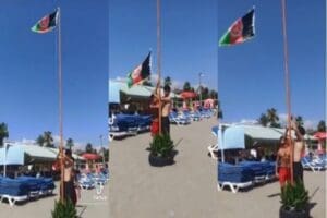 Antalya'nın Alanya il&ccedil;esinde Afgan uyruklu 2 kişi Afganistan bayrağını g&ouml;ndere