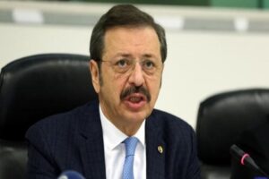 T&uuml;rkiye Odalar ve Borsalar Birliği (TOBB) Başkanı Rifat Hisarcıklıoğlu, karşılığı