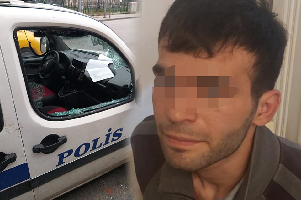 İzmir'in Konak ilçesinde, park halindeki 2 polis otosunun camlarını kıran