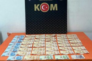 İzmir'in Ödemiş ilçesinde, piyasaya sahte para sürmeye çalıştığı belirlenip, polis
