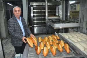 İzmir Ticaret Odası (İZTO) Meclisi'nde alınan zam kararı sonrası konuşan
