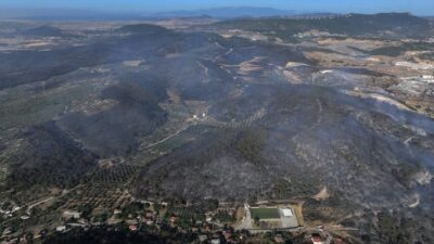 Aliağa'da izinsiz çöp yaktığı için ormanlık alanın zarar görmesine sebep