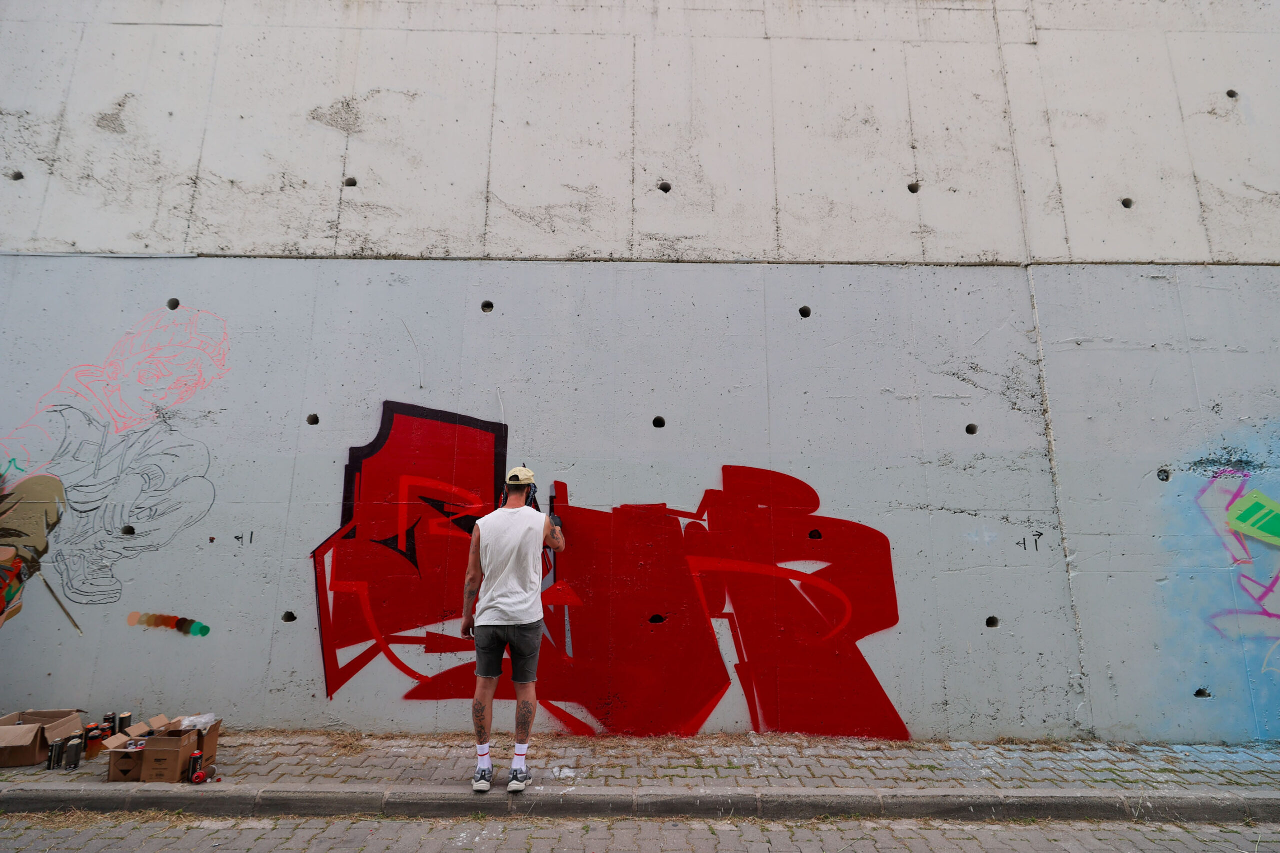 Buca’nın duvarları tuvale dönüştü: 2. Grafiti Şenliği renkli görüntülere sahne oldu