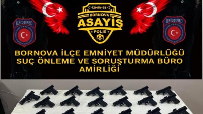 İzmir'in Bornova ilçesinde emniyet güçlerinin iki ayrı adrese düzenlediği eş