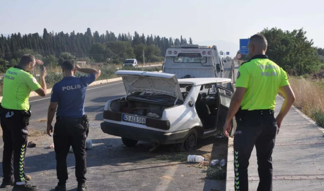 İzmir'in Ödemiş ilçesinde seyir halindeyken lastiği patlayan otomobilin kontrolden çıkarak
