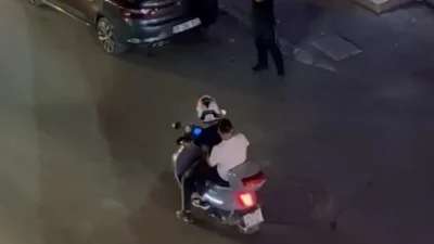 İzmir'in Karabağlar ilçesinde gece saatlerinde kar maskeli bir şahıs, kapalı