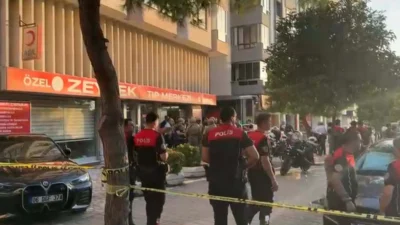 İzmir’in Karabağlar ilçesinde bir banka şubesine giren şüpheli, özel güvenlik